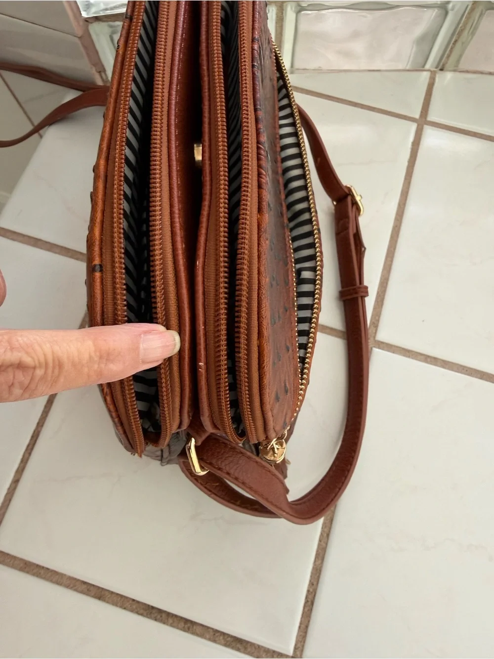 Women's Brown Crossbody Bag with Crock Print & Tassel Zip Pocket